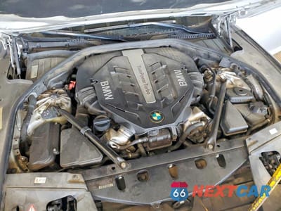 Zdjęcie 11 z 12 samochodu: 2012 BMW 750 LXI VIN:WBAKC8C5XCC436666 - miniatura