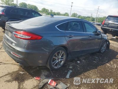 Trzecie zdjęcie samochodu z tyłu: 2019 FORD FUSION SEL VIN:3FA6P0CD0KR140580 - miniatura