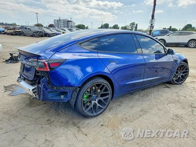 Trzecie zdjęcie samochodu z tyłu: 2022 TESLA MODEL 3 VIN:5YJ3E1EB5NF138334 - miniatura