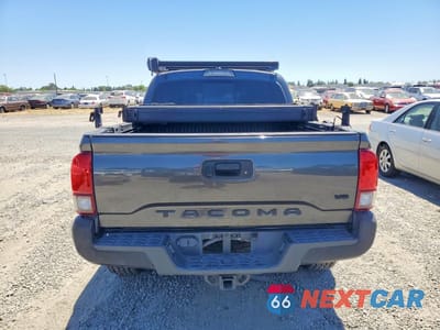 Zdjęcie 6 z 12 samochodu: 2018 TOYOTA TACOMA SR5 V6 VIN:3TMAZ5CN8JM053574 - miniatura