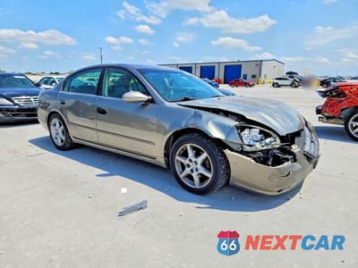 Czwarte zdjęcie samochodu z boku: 2002 NISSAN ALTIMA SE VIN:1N4BL11EX2C103434 - miniatura