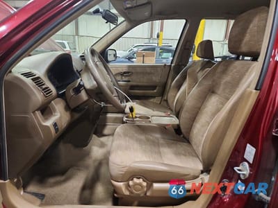 Zdjęcie 7 z 13 samochodu: 2004 HONDA CR-V LX VIN:JHLRD78474C037937 - miniatura