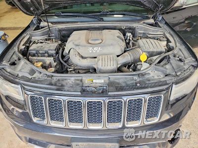 Zdjęcie 12 z 13 samochodu: 2014 JEEP GRAND CHEROKEE OVERLAND VIN:1C4RJFCG5EC172708 - miniatura