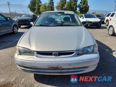 Piąte zdjęcie samochodu w środku: 2000 TOYOTA COROLLA VE VIN:1NXBR12E7YZ356734 - miniatura