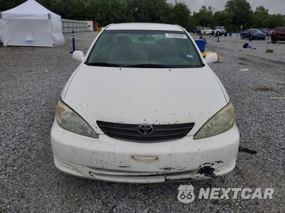 Piąte zdjęcie samochodu w środku: 2002 TOYOTA CAMRY LE VIN:4T1BE32K32U110056 - miniatura