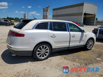 Trzecie zdjęcie samochodu z tyłu: 2011 LINCOLN MKT VIN:2LMHJ5AT0BBJ52738 - miniatura