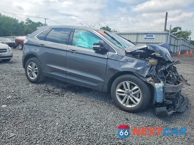 Czwarte zdjęcie samochodu z boku: 2017 FORD EDGE SEL VIN:2FMPK3J94HBB44146 - miniatura