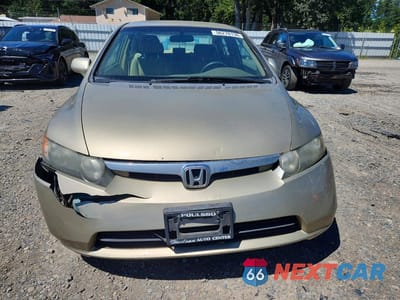 Piąte zdjęcie samochodu w środku: 2007 HONDA CIVIC LX VIN:1HGFA16597L013999 - miniatura