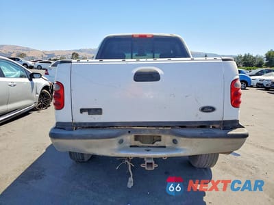 Zdjęcie 6 z 12 samochodu: 2002 FORD F150 SUPERCREW VIN:1FTRW08612KB17365 - miniatura