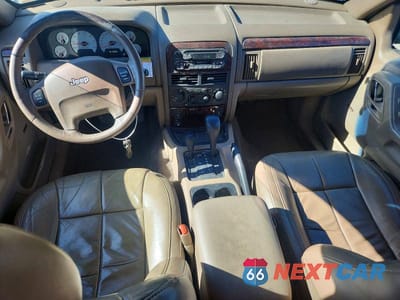 Zdjęcie 8 z 12 samochodu: 2001 JEEP GRAND CHEROKEE LIMITED VIN:1J4GW58N01C627348 - miniatura