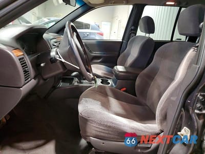 Zdjęcie 7 z 13 samochodu: 1999 JEEP GRAND CHEROKEE LAREDO VIN:1J4GW58S7XC553733 - miniatura