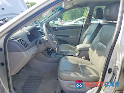 Zdjęcie 7 z 12 samochodu: 2005 TOYOTA CAMRY LE VIN:4T1BE30K05U005546 - miniatura