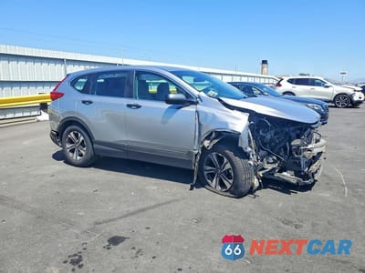 Czwarte zdjęcie samochodu z boku: 2017 HONDA CR-V LX VIN:2HKRW6H37HH218605 - miniatura