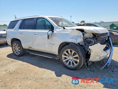 Czwarte zdjęcie samochodu z boku: 2021 CHEVROLET TAHOE K1500 PREMIER VIN:1GNSKSKDXMR140693 - miniatura