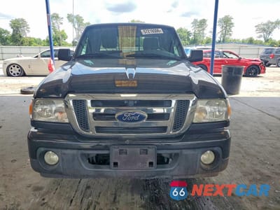 Piąte zdjęcie samochodu w środku: 2011 FORD RANGER SUPER CAB VIN:1FTKR4EE9BPA90799 - miniatura