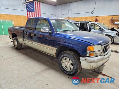 Czwarte zdjęcie samochodu z boku: 1999 GMC NEW SIERRA K1500 VIN:2GTEK19TXX1548007 - miniatura