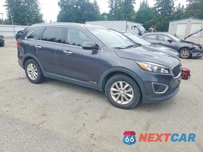 Czwarte zdjęcie samochodu z boku: 2017 KIA SORENTO LX V6 VIN:5XYPGDA51HG293294 - miniatura