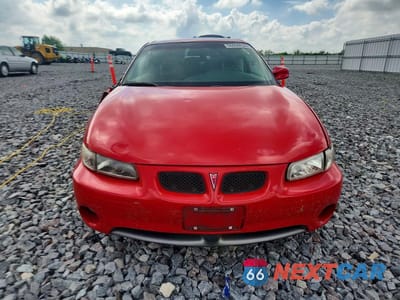 Piąte zdjęcie samochodu w środku: 1999 PONTIAC GRAND PRIX GXP VIN:1G2WP12K8XF204289 - miniatura