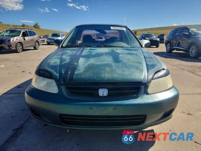 Piąte zdjęcie samochodu w środku: 1999 HONDA CIVIC EX VIN:1HGEJ8241XL004554 - miniatura