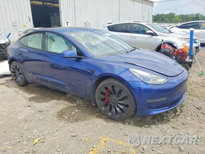 Czwarte zdjęcie samochodu z boku: 2023 TESLA MODEL 3 VIN:5YJ3E1EC9PF472300 - miniatura