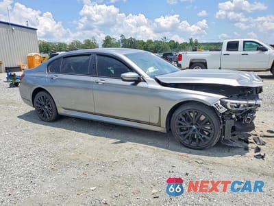 Czwarte zdjęcie samochodu z boku: 2022 BMW 750 XI VIN:WBA7U2C04NCG95132 - miniatura