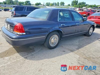 Trzecie zdjęcie samochodu z tyłu: 1999 FORD CROWN VICTORIA VIN:2FAFP73W0XX121210 - miniatura