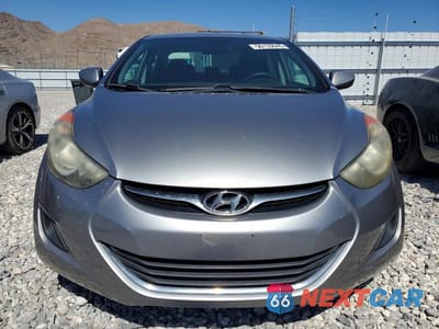 Piąte zdjęcie samochodu w środku: 2013 HYUNDAI ELANTRA GLS VIN:KMHDH4AE7DU556070 - miniatura
