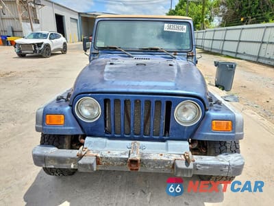Piąte zdjęcie samochodu w środku: 2000 JEEP WRANGLER / TJ SE VIN:1J4FA29P2YP771267 - miniatura