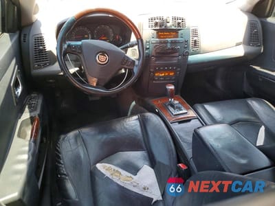 Zdjęcie 8 z 12 samochodu: 2004 CADILLAC SRX VIN:1GYEE637140160892 - miniatura