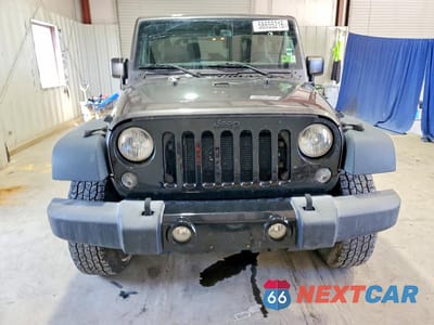 Piąte zdjęcie samochodu w środku: 2016 JEEP WRANGLER SPORT VIN:1C4GJWAG9GL171025 - miniatura