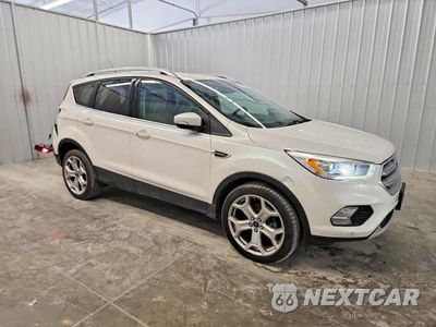 Czwarte zdjęcie samochodu z boku: 2019 FORD ESCAPE TITANIUM VIN:1FMCU9J92KUA56337 - miniatura