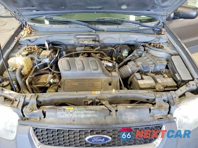 Zdjęcie 12 z 13 samochodu: 2003 FORD ESCAPE VIN:1FMCU93153KC34942 - miniatura