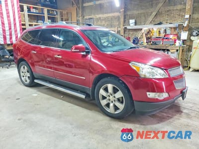 Czwarte zdjęcie samochodu z boku: 2012 CHEVROLET TRAVERSE LTZ VIN:1GNKVLED6CJ158274 - miniatura
