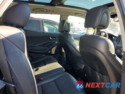 Zdjęcie 11 z 13 samochodu: 2013 HYUNDAI SANTA FE SPORT 2.0T VIN:5XYZUDLA7DG107912 - miniatura