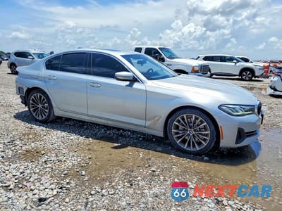 Czwarte zdjęcie samochodu z boku: 2021 BMW 530 I VIN:WBA53BH03MWW94311 - miniatura