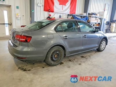 Trzecie zdjęcie samochodu z tyłu: 2017 VOLKSWAGEN JETTA S VIN:3VW167AJXHM286142 - miniatura