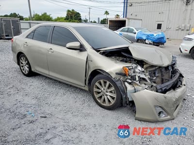 Czwarte zdjęcie samochodu z boku: 2014 TOYOTA CAMRY HYBRID XLE VIN:4T1BD1FK2EU123662 - miniatura