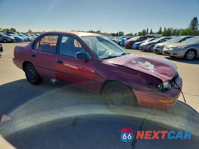 Czwarte zdjęcie samochodu z boku: 1993 TOYOTA COROLLA DELUXE VIN:1NXAE09EXPZ104305 - miniatura