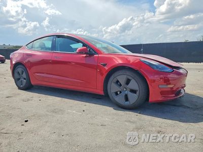 Czwarte zdjęcie samochodu z boku: 2021 TESLA MODEL 3 VIN:5YJ3E1EA9MF047136 - miniatura