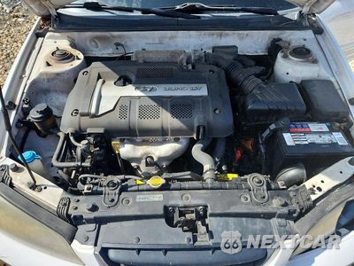 Zdjęcie 11 z 12 samochodu: 2005 HYUNDAI ELANTRA GLS VIN:KMHDN46D45U978727 - miniatura