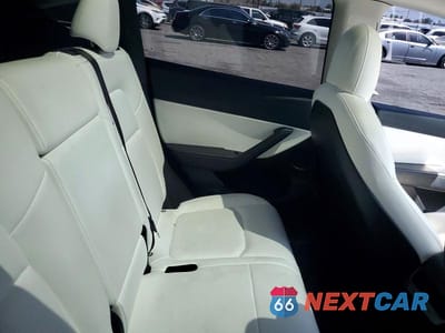 Zdjęcie 11 z 13 samochodu: 2022 TESLA MODEL Y VIN:7SAYGAEE6NF489086 - miniatura