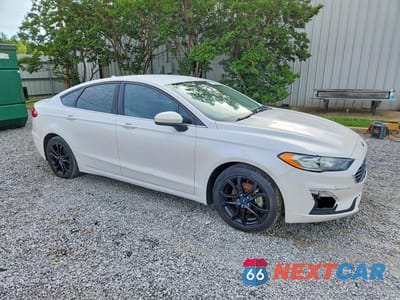 Czwarte zdjęcie samochodu z boku: 2019 FORD FUSION SE VIN:3FA6P0HD8KR229421 - miniatura