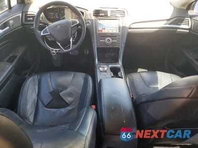 Zdjęcie 8 z 12 samochodu: 2017 FORD FUSION TITANIUM PHEV VIN:3FA6P0SU2HR209828 - miniatura