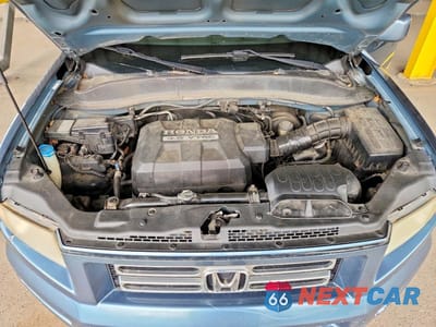 Zdjęcie 11 z 12 samochodu: 2006 HONDA RIDGELINE RTS VIN:2HJYK16456H520756 - miniatura