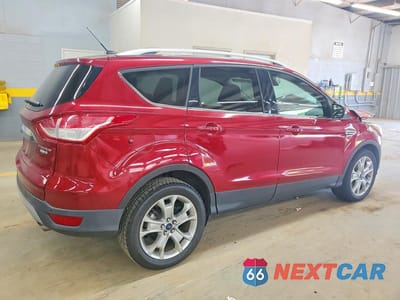 Trzecie zdjęcie samochodu z tyłu: 2016 FORD ESCAPE TITANIUM VIN:1FMCU9J98GUB67563 - miniatura