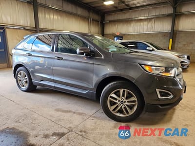 Czwarte zdjęcie samochodu z boku: 2016 FORD EDGE SEL VIN:2FMPK4J98GBC25235 - miniatura