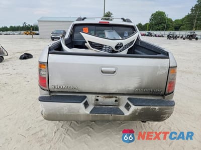 Zdjęcie 6 z 12 samochodu: 2006 HONDA RIDGELINE RT VIN:2HJYK16286H571165 - miniatura
