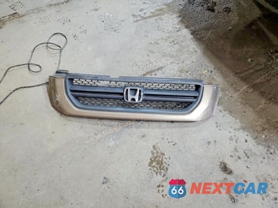 Zdjęcie 13 z 14 samochodu: 2003 HONDA PILOT EX VIN:2HKYF18413H606557 - miniatura