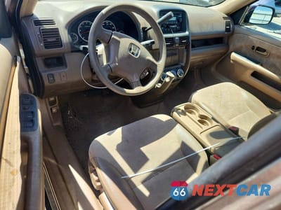Zdjęcie 8 z 12 samochodu: 2004 HONDA CR-V LX VIN:JHLRD78444C025843 - miniatura