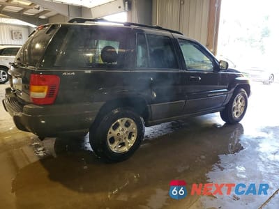 Trzecie zdjęcie samochodu z tyłu: 1999 JEEP GRAND CHEROKEE LAREDO VIN:1J4GW58S7XC553733 - miniatura